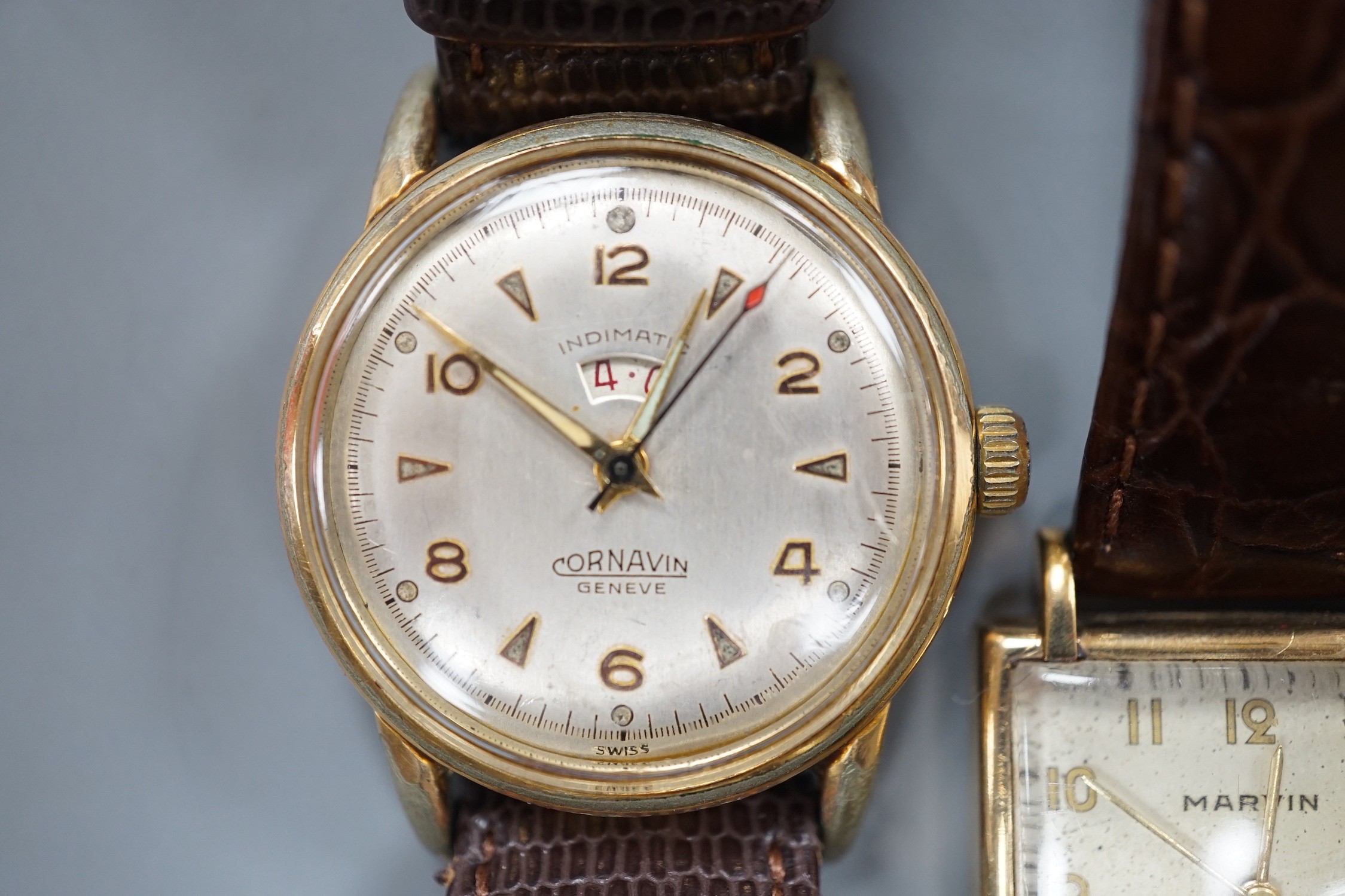 A gentleman's 1940's 9ct gold Marvin square dial manual wind wrist watch, on a later leather strap, together with two other gentleman's steel and gold plated wrist watches, Cornavin and Curtiss automatic.